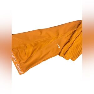 Nike pro dri-fit size small- yellow-orange
